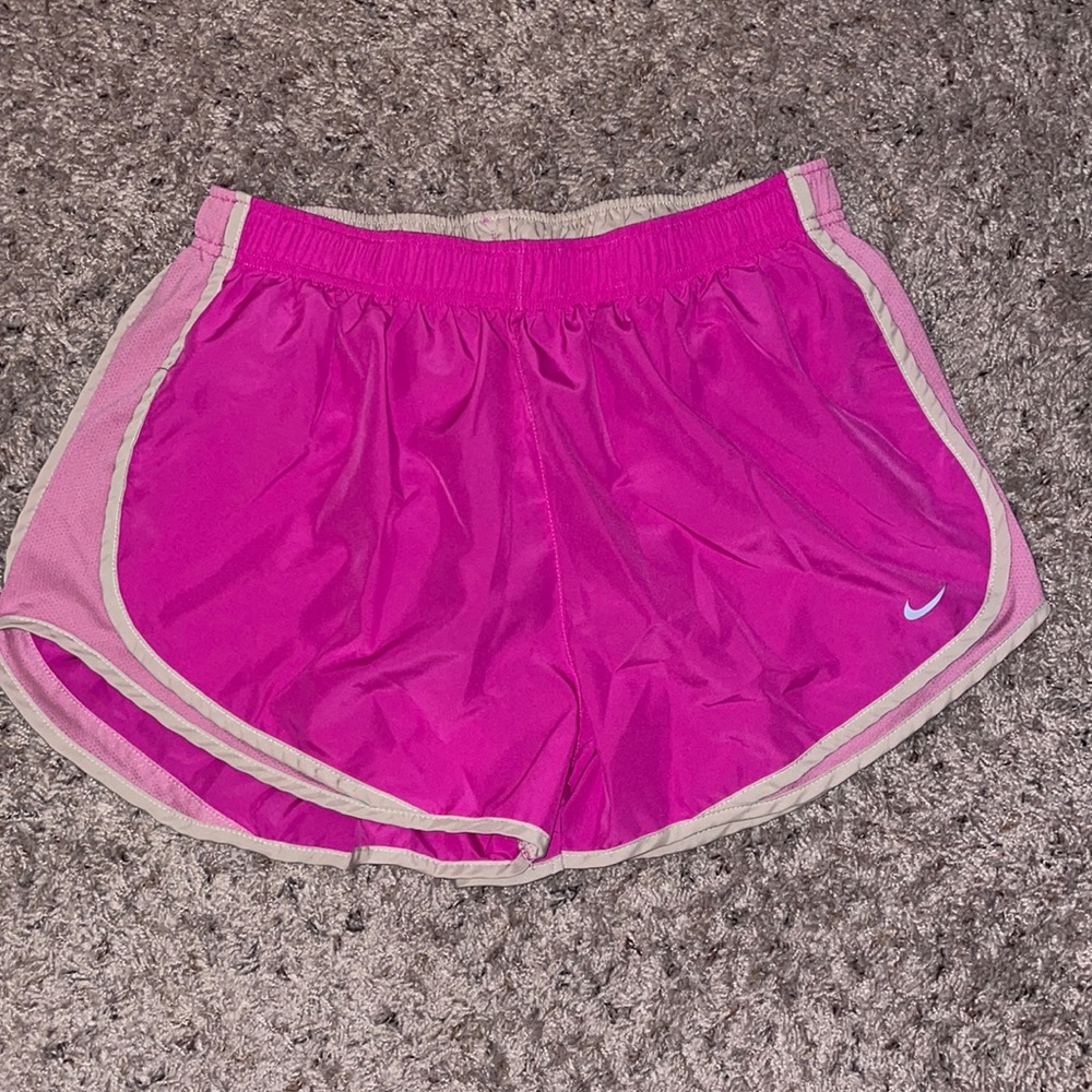 Pink Nike running shorts